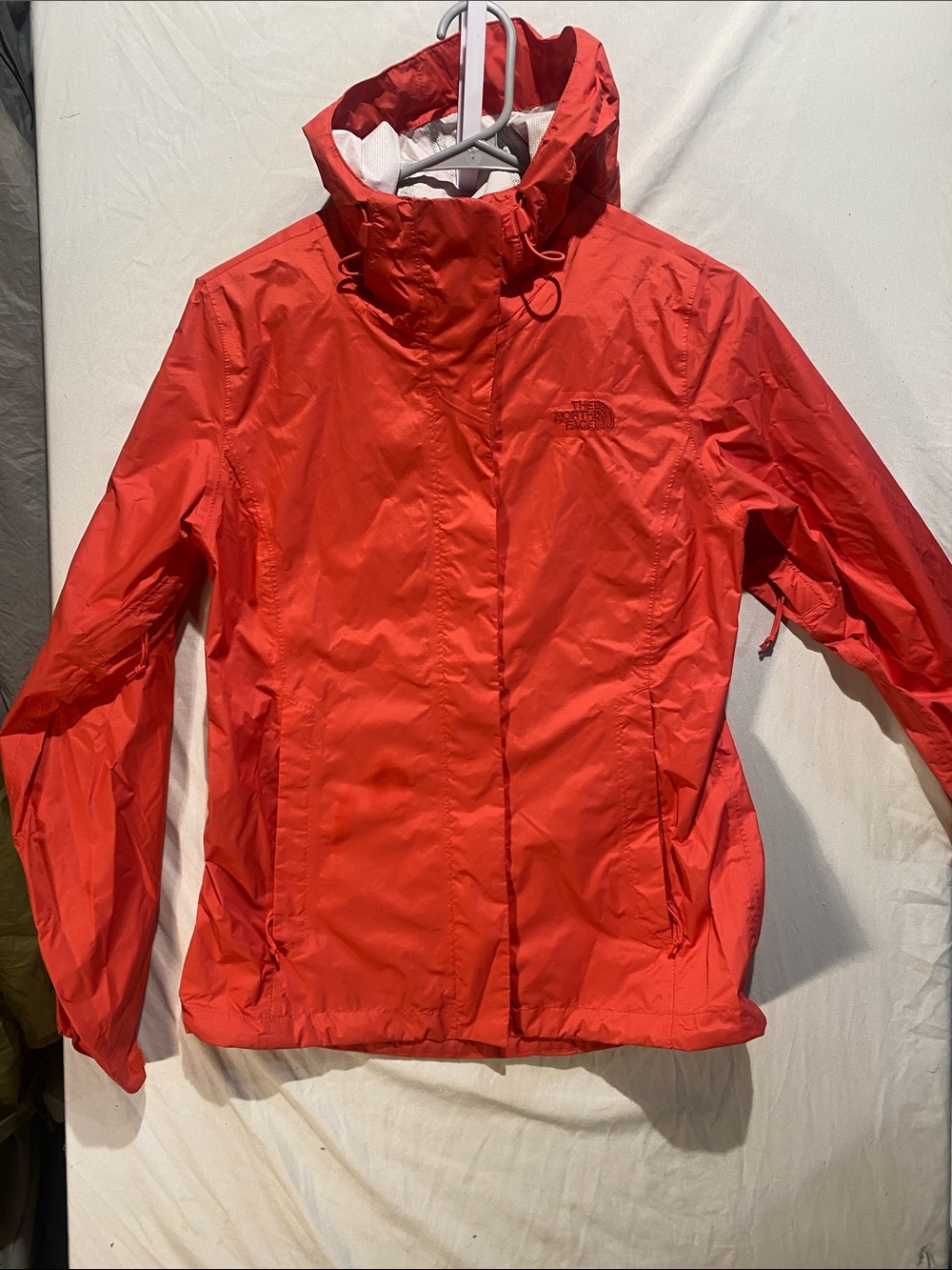 The North Face Women's coral color Hooded rain Jacket